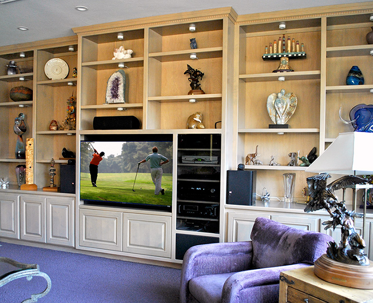 Custom entertainment center with TV and audio equipment